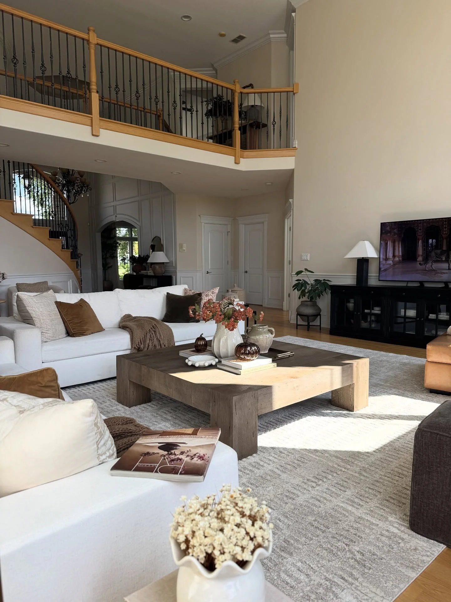 6. Spacious Comfort with Organic Browns (Fall Living Room Decor Ideas)