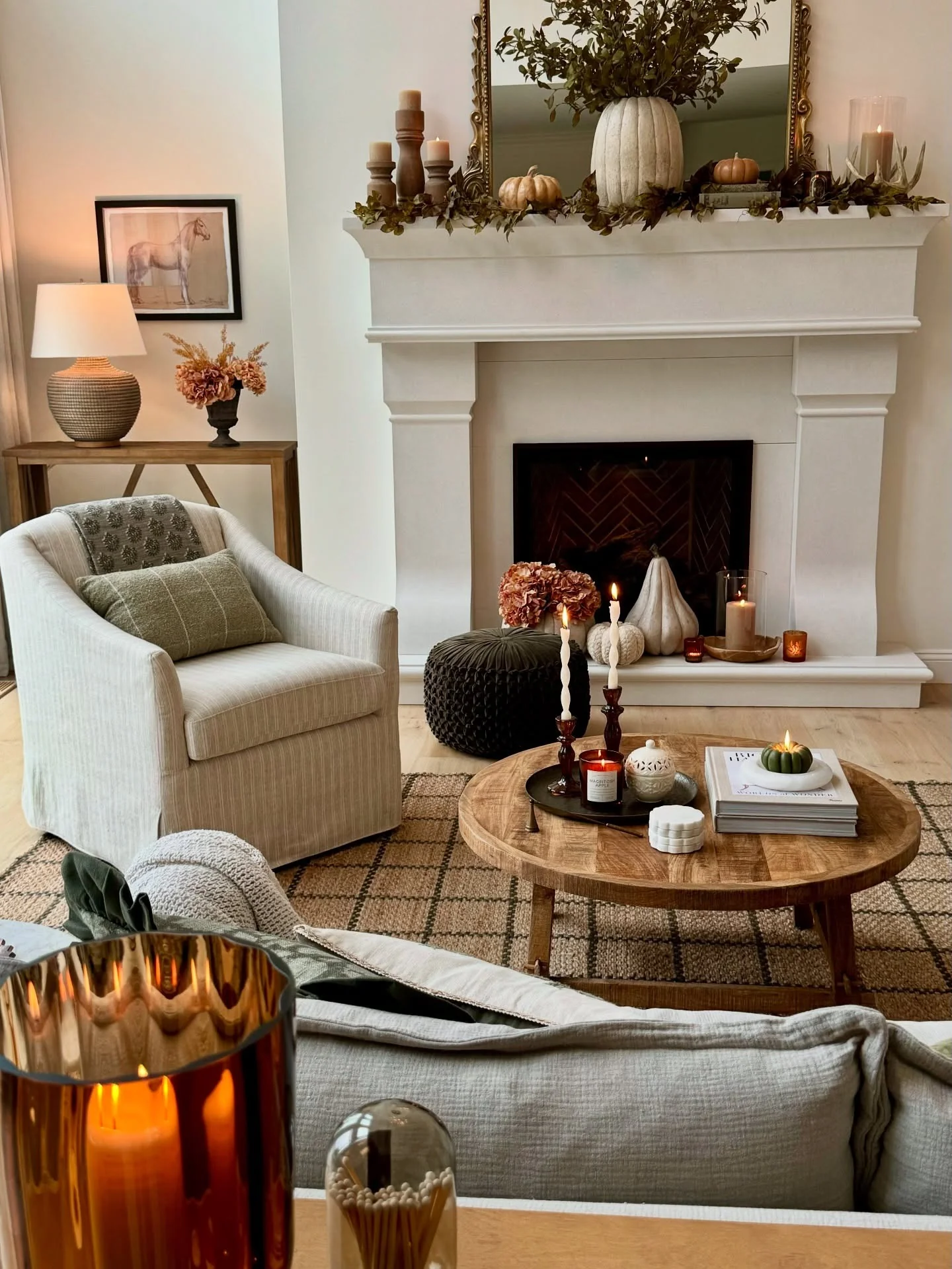 8. Soft Neutrals with Seasonal Glow (Fall Living Room Decor Ideas)
