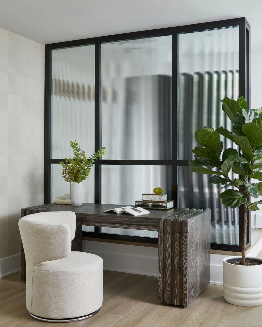 14. Monochrome Elegance with Glass Partition (Simple Office Ideas)