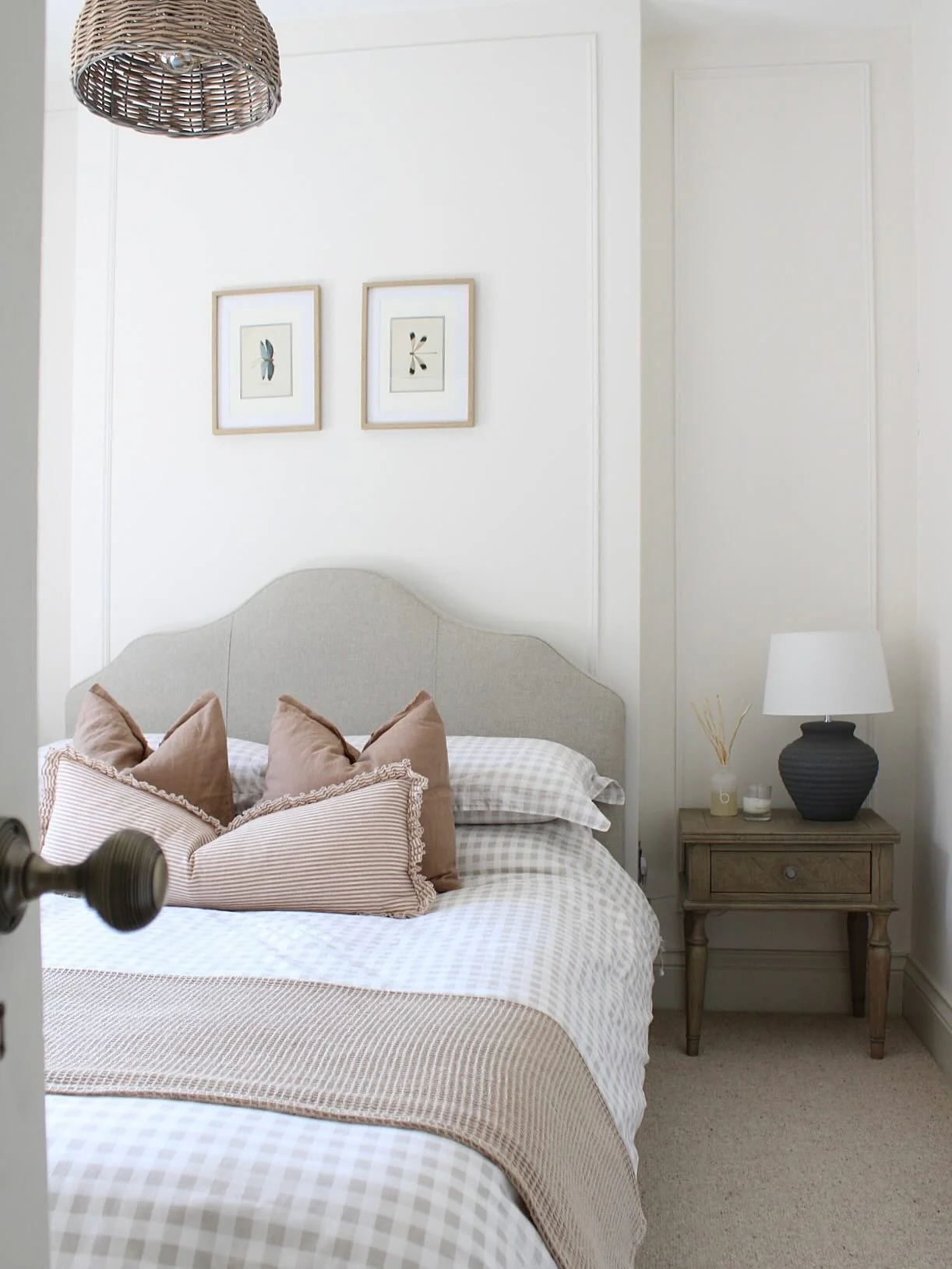 5. Neutral Simplicity with Soft Patterns (Blank Wall Bedroom Ideas)