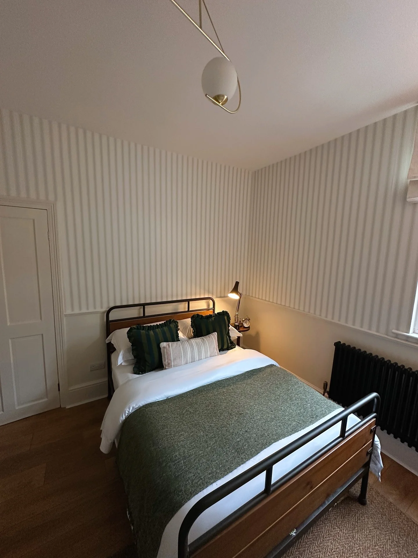 3. Modern Stripe with Forest Accents (Blank Wall Bedroom Ideas)