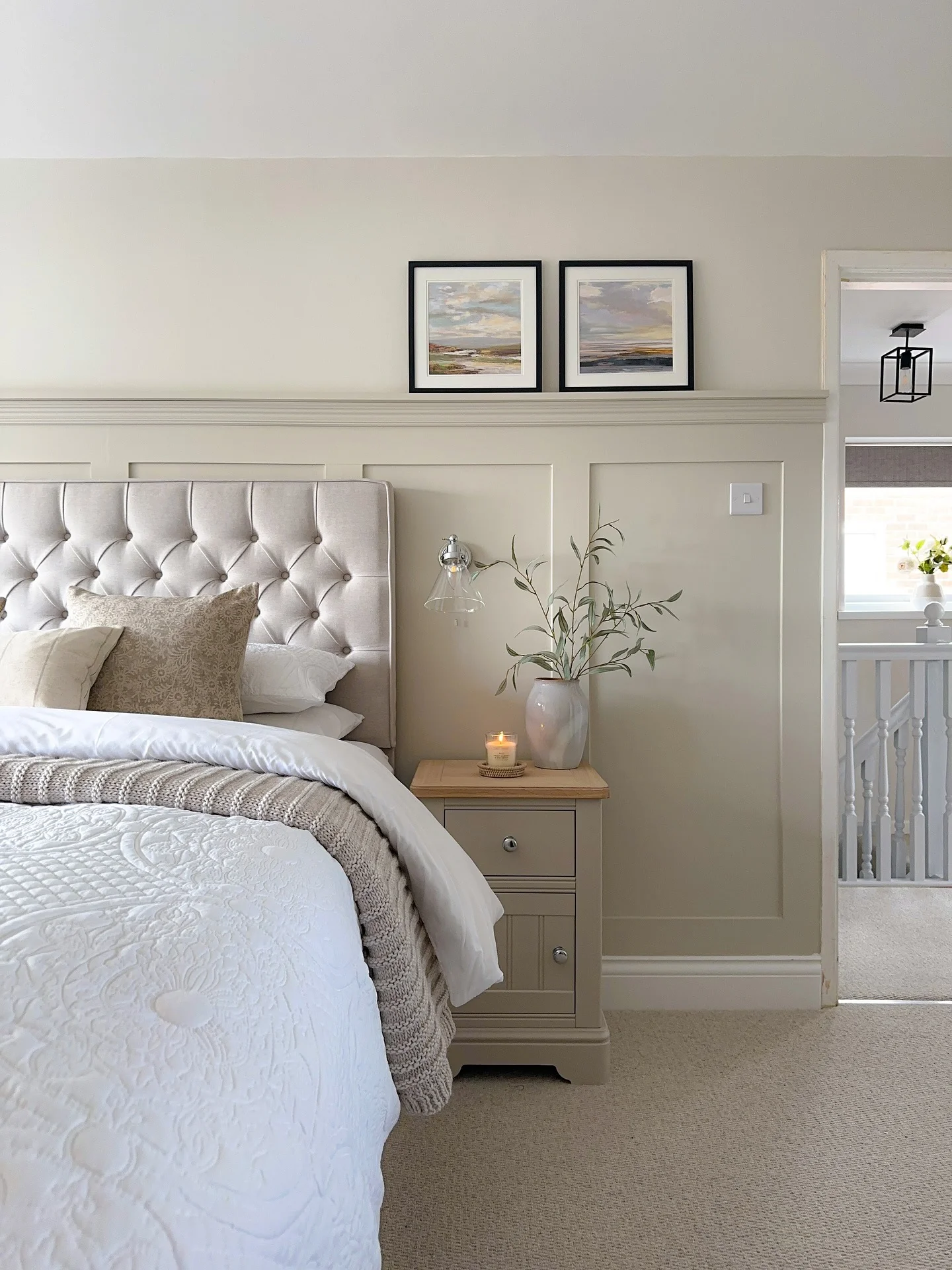 11. Soft Neutrals with Classic Panel Detailing (Blank Wall Bedroom Ideas)