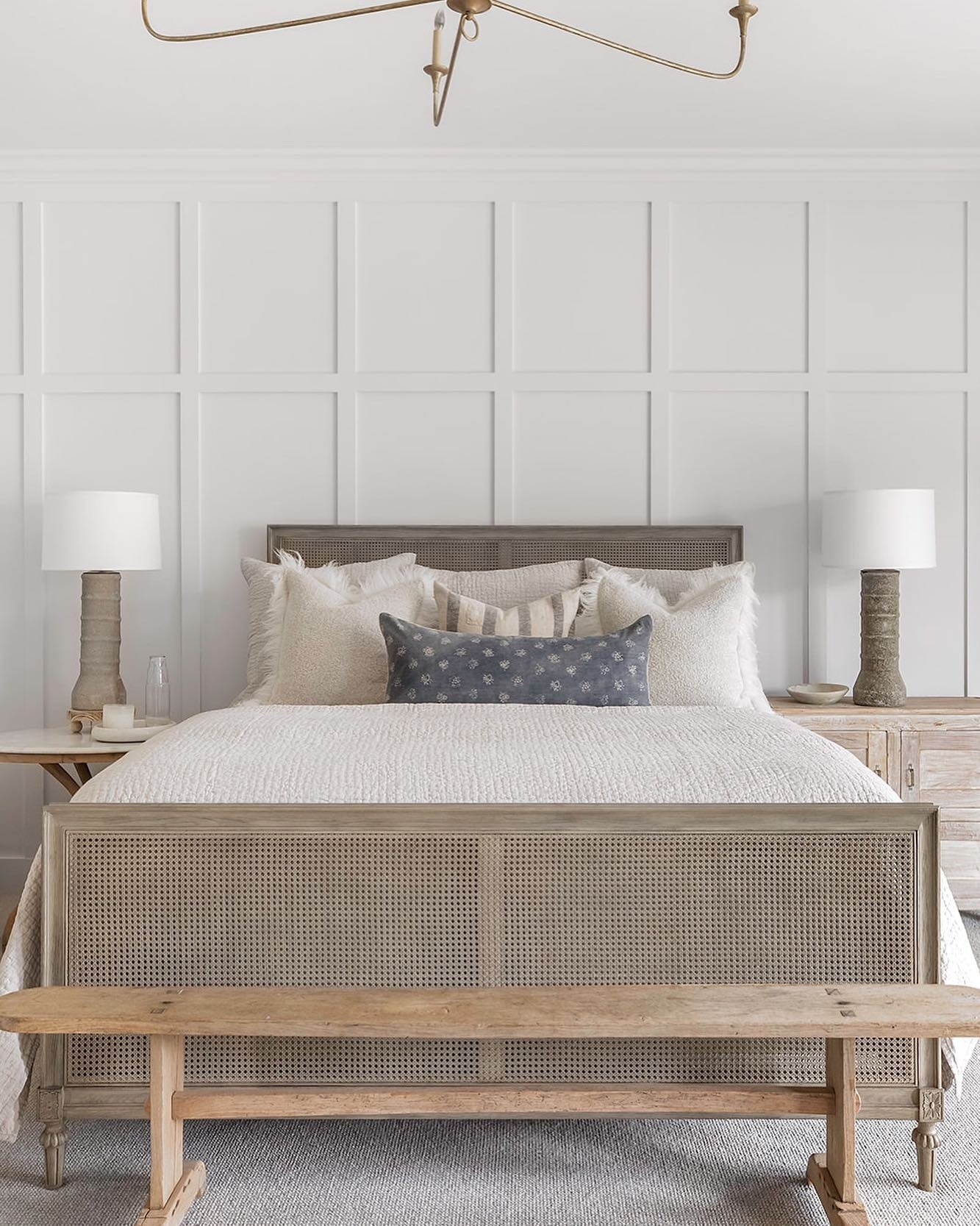 14. Modern Cottage with White Paneling (Blank Wall Bedroom Ideas)