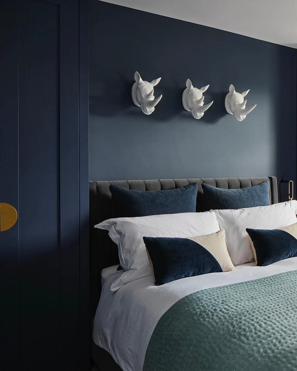 4. Monochrome Navy Bedroom with Sculptural Accents (Blue Wall Bedroom Ideas)