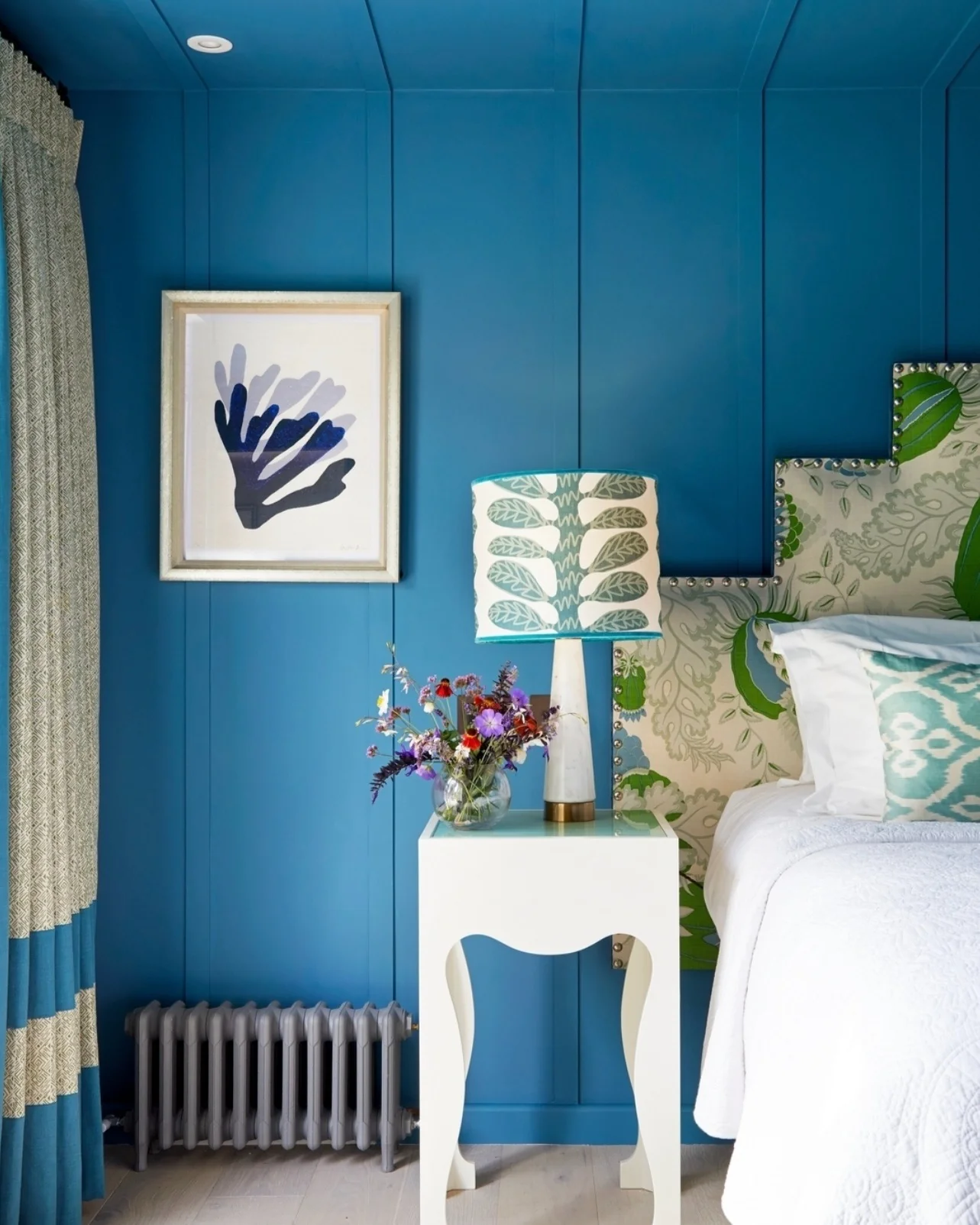 7. Bold Blue Paneling with Green Accents (Blue Wall Bedroom Ideas)