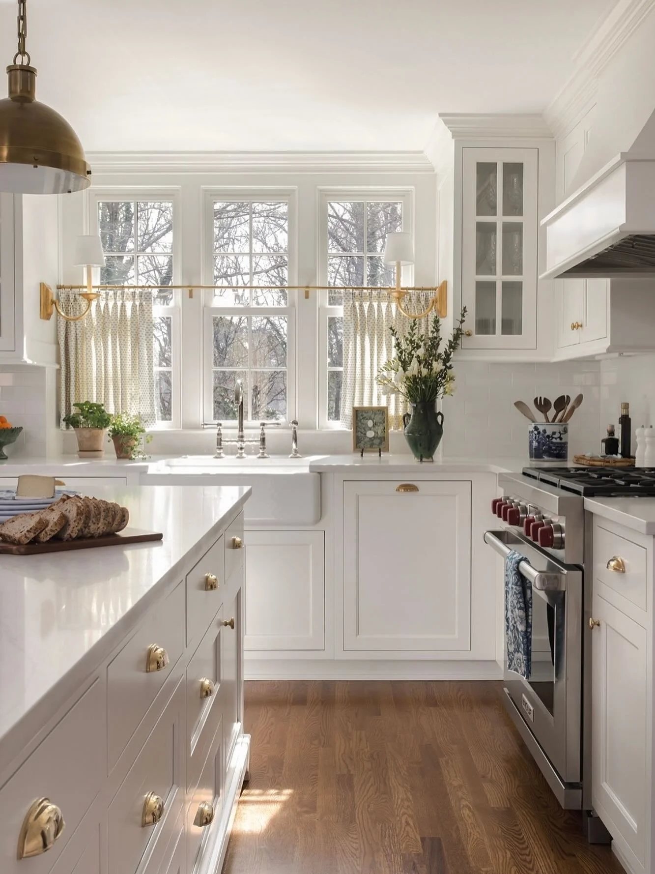 10. Timeless White Kitchen with Brass Accents (Small White Kitchen Ideas)