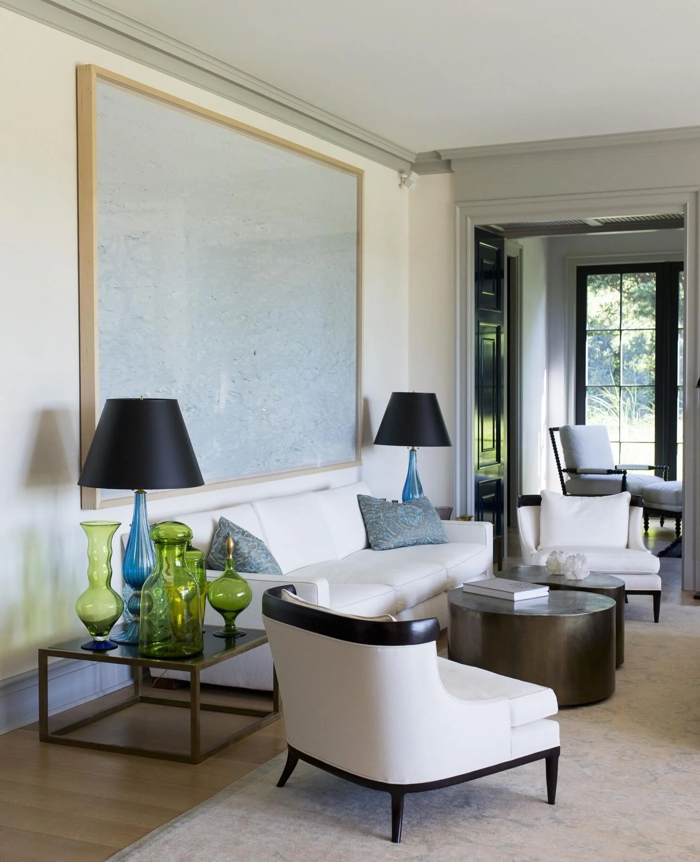 6. Artistic Touch with Subtle Blue Details (Gray and Blue Living Room Ideas)