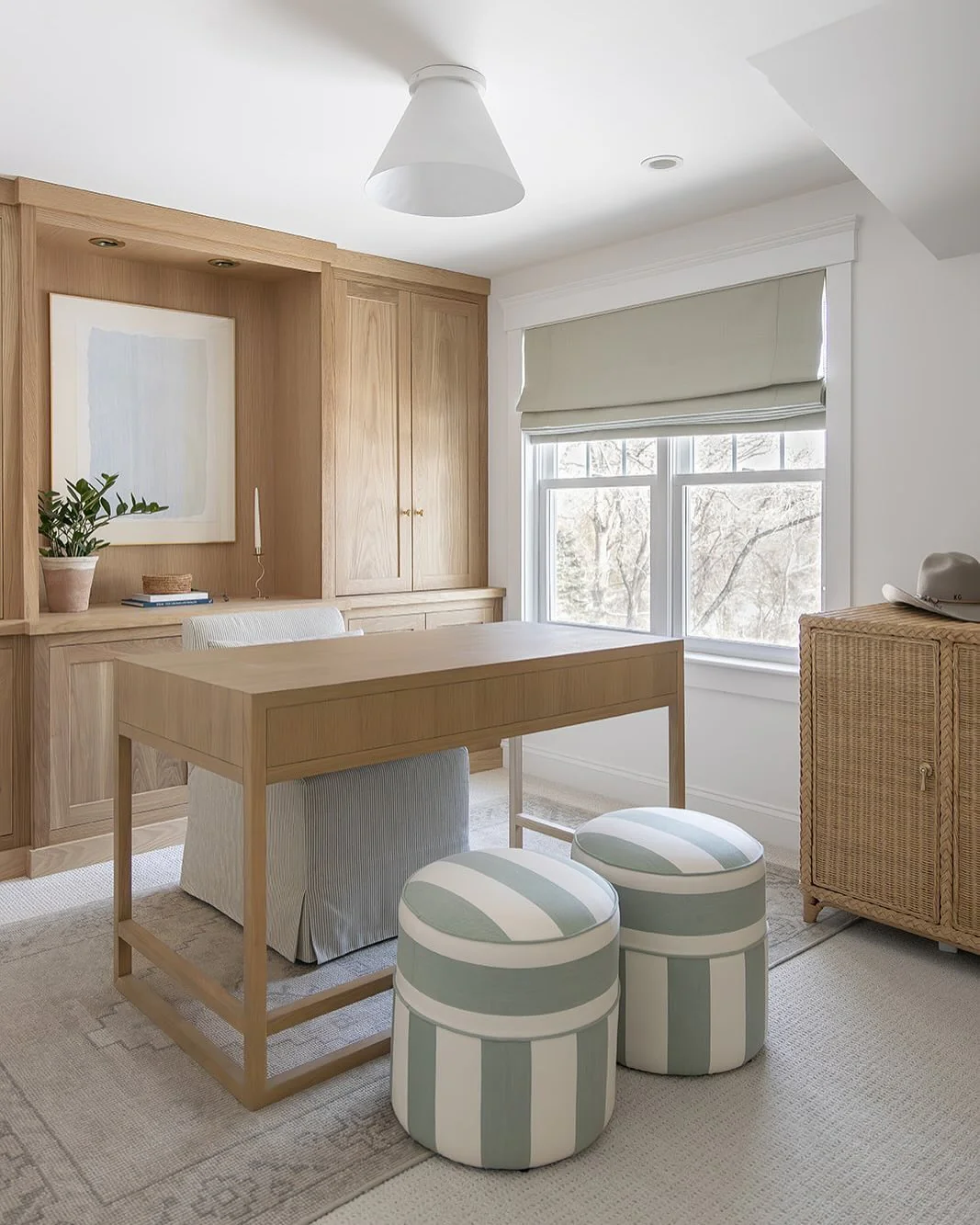 5. Light Wood with Striped Accents (Small Therapy Office Decor Ideas)