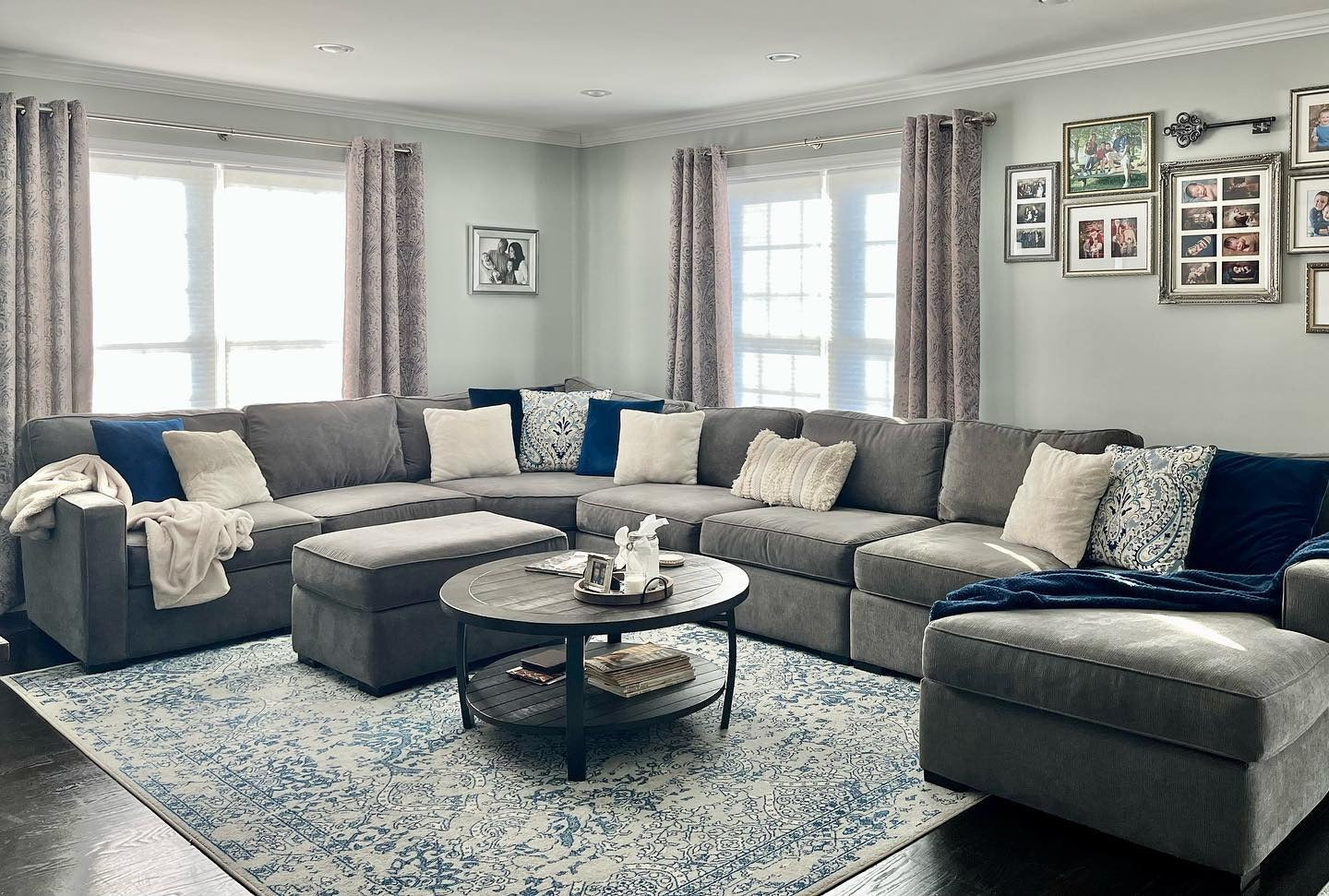 5. Cozy Sectional with Patterned Blue Rug (Grey and Blue Living Room Ideas)