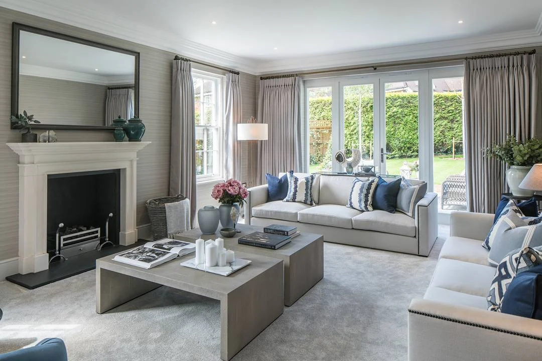 6. Classic Neutral with Blue Cushion Accents (Grey and Blue Living Room Ideas)