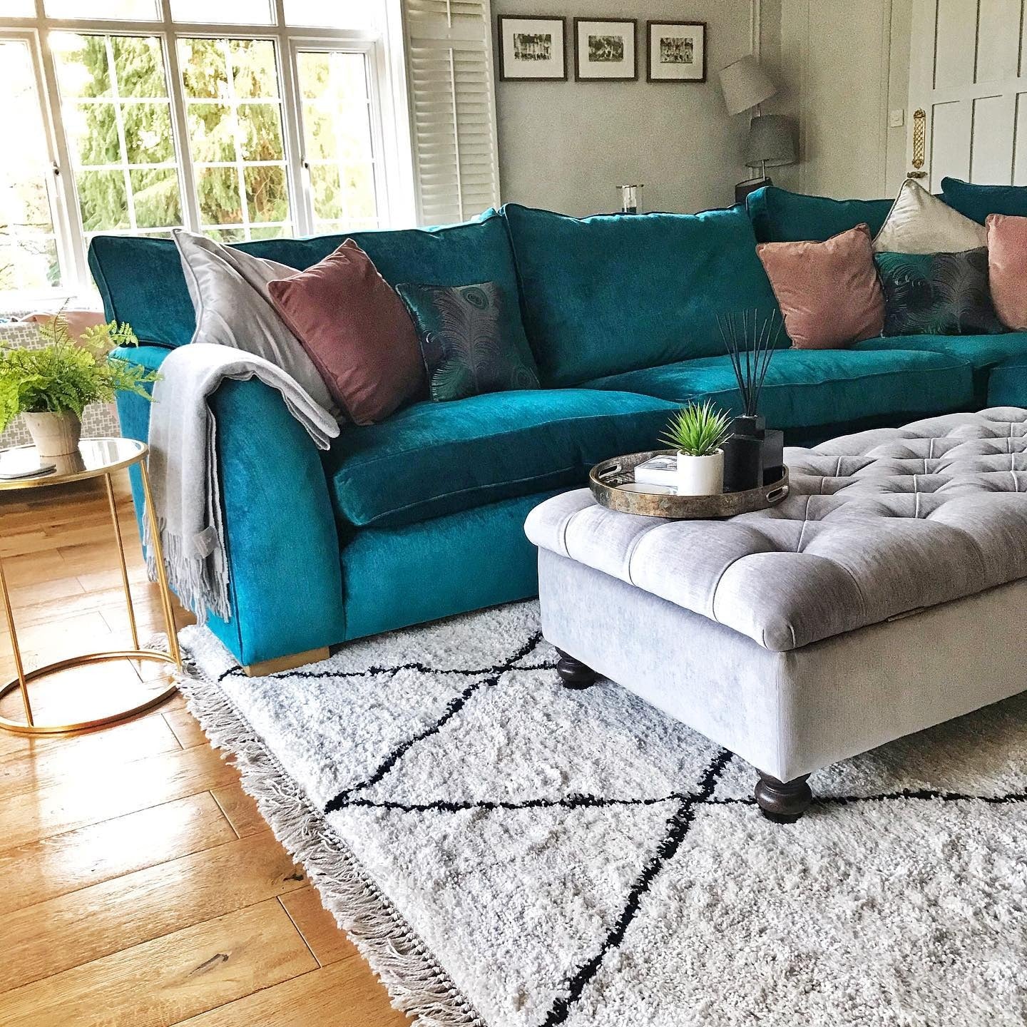 4. Cozy Vibrance with Teal Velvet (Teal and Grey Living Room Ideas)