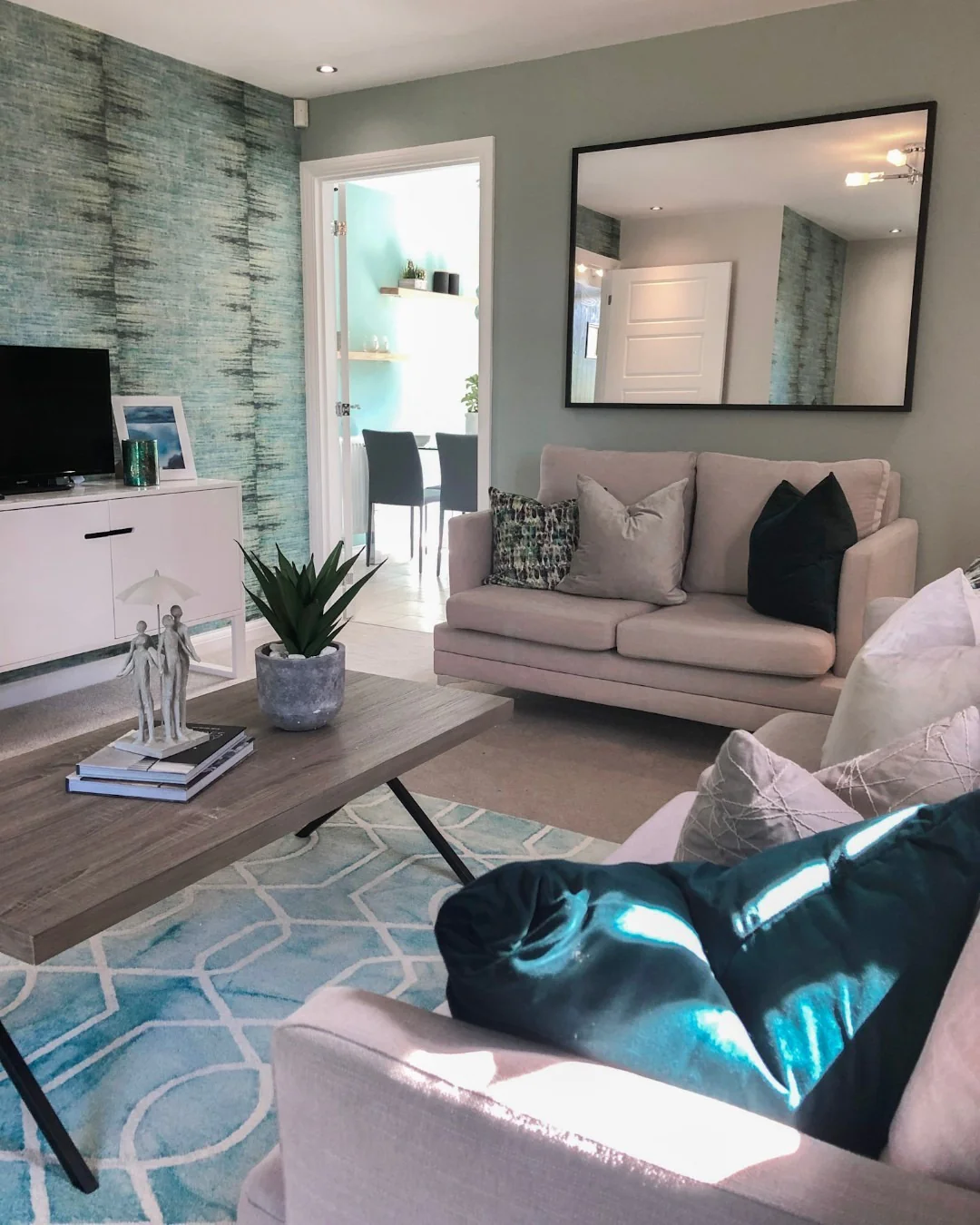 12. Soft Grey Comfort with Teal Accents (Teal and Grey Living Room Ideas)