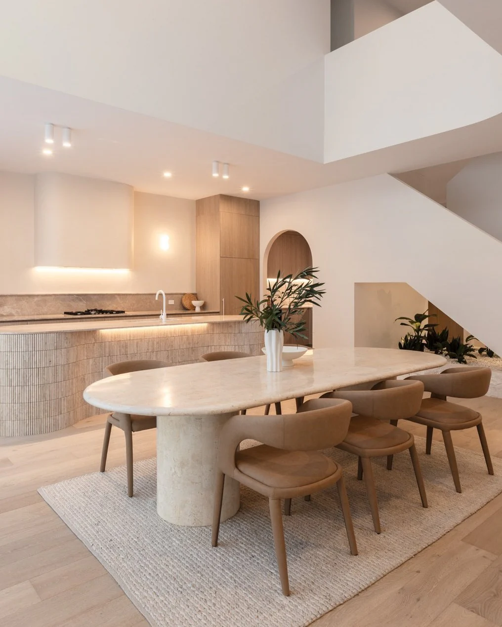 12. Minimalist Elegance in Stone and Beige (Kitchen Centerpiece Ideas)