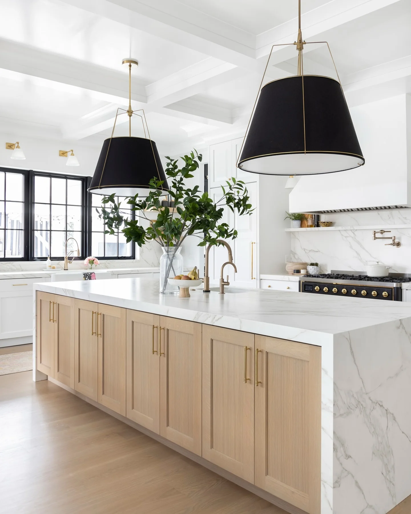 13. Black Accents with Marble Sophistication (Kitchen Centerpiece Ideas)