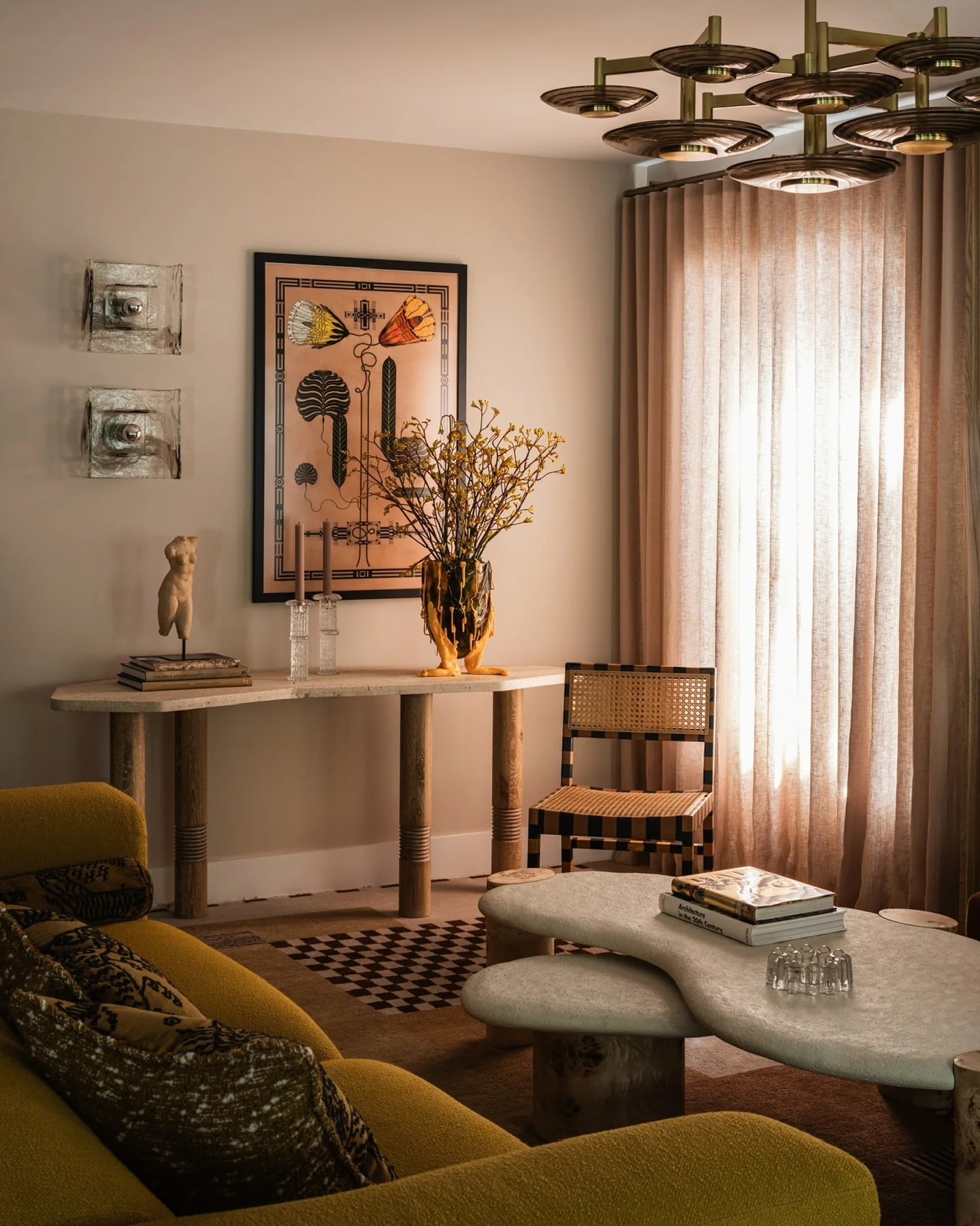 4. Eclectic Gold and Mustard Statement (Brown and Gold Living Room Ideas)