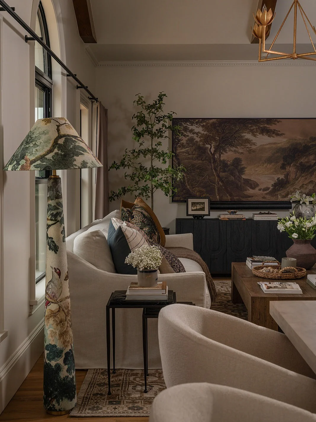 8. Classic Layers with Artistic Touches (Brown and Gold Living Room Ideas)