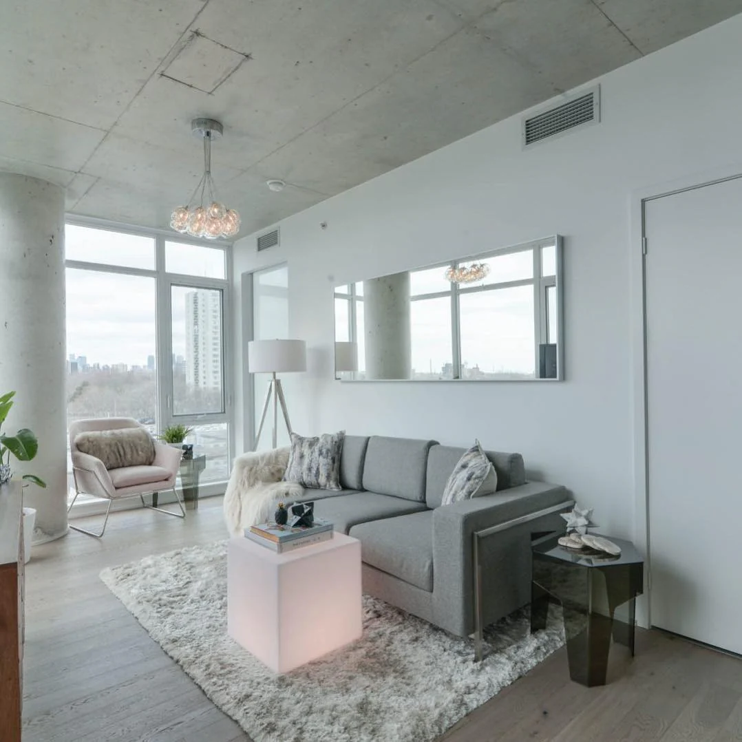 4. Urban Chic with Industrial Touches (Condo Living Room Ideas)