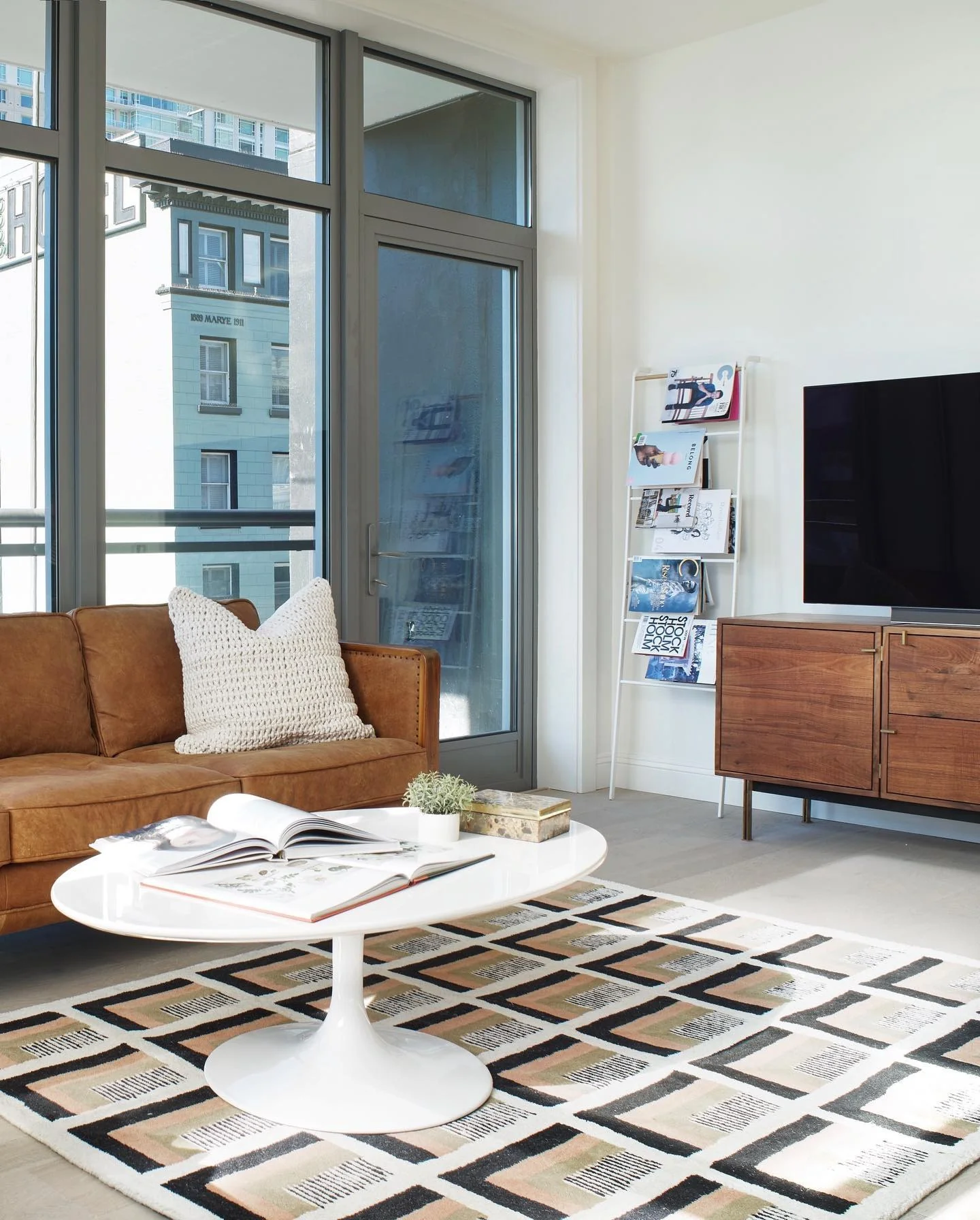 5. Mid-Century Modern with Graphic Contrast (Condo Living Room Ideas)