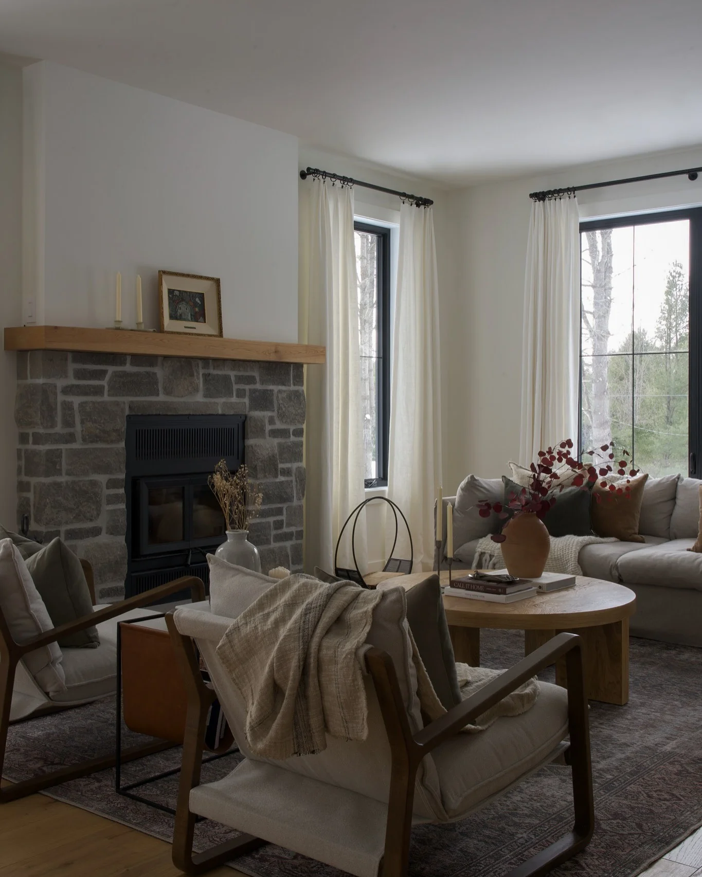 2. Modern Rustic Stone and Wood Balance (Fireplace Living Room Ideas)