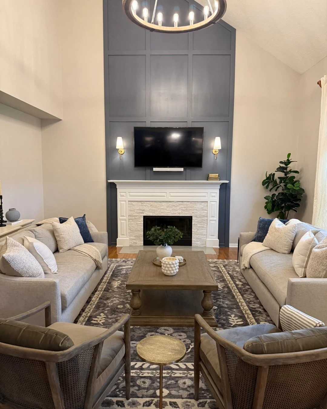 8. Sophisticated Fireplace with Deep Blue Accent Wall (Fireplace Living Room Ideas)