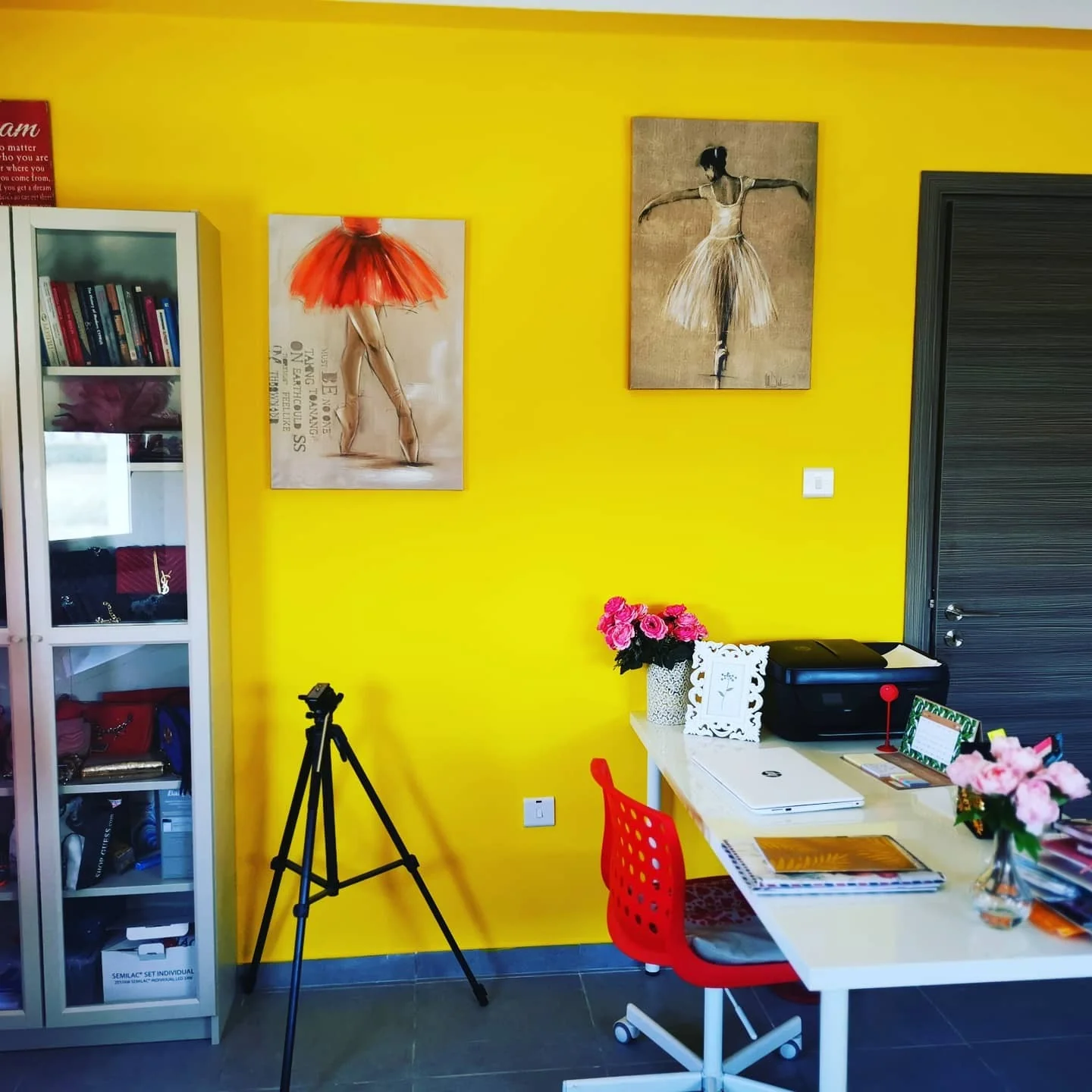 9. Vibrant Yellow Office with Artistic Flair (Yellow Office Ideas)