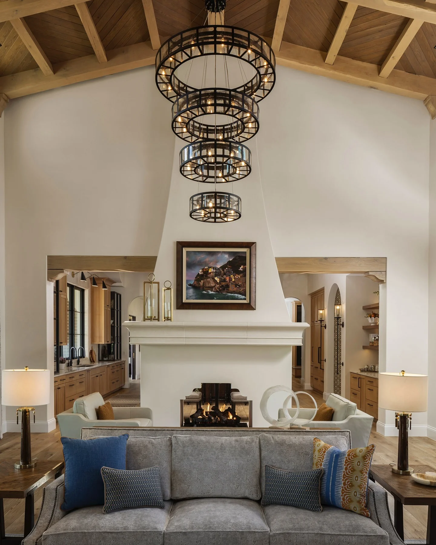 11. Layered Drama with Tiered Metal Rings (Living Room Chandelier Ideas)