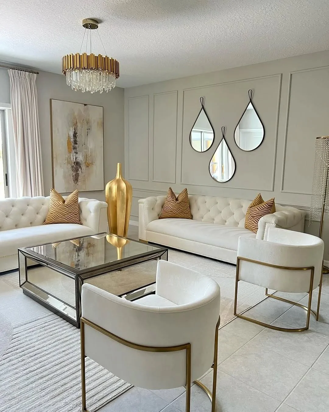 9. Glamorous Touch with Mirrored Details (Living Room Chandelier Ideas)
