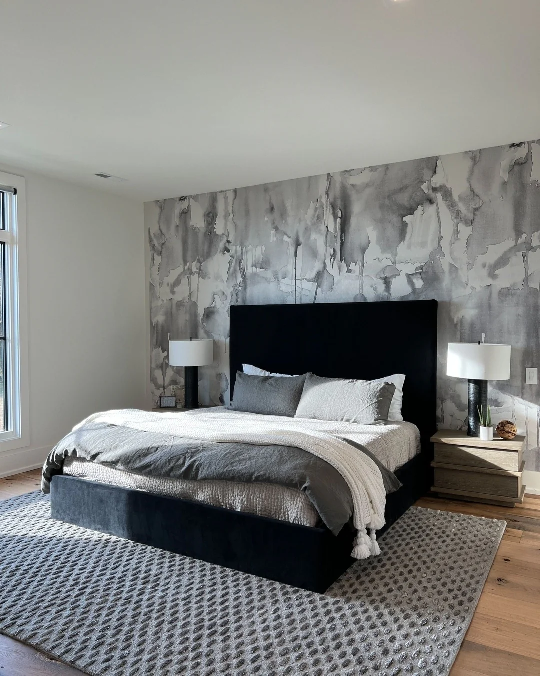 8. Artistic Statement Wall (Grayscale Bedroom Ideas)