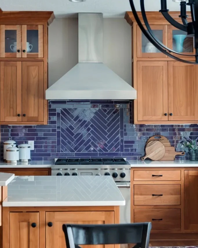 5. Bold Statement with Navy Herringbone (Kitchen Backsplash Ideas)