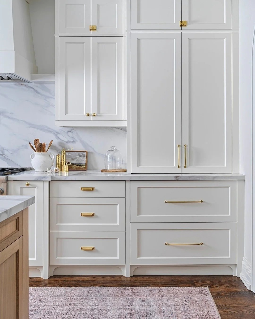 3. Crisp White with Gold Touches (Kitchen Cabinet Paint Ideas)