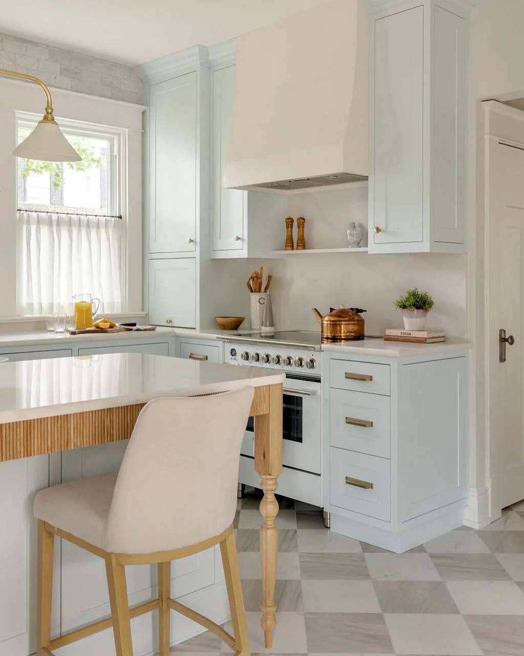 5. Soft Powder Blue with Warm Neutrals (Kitchen Cabinet Paint Ideas)