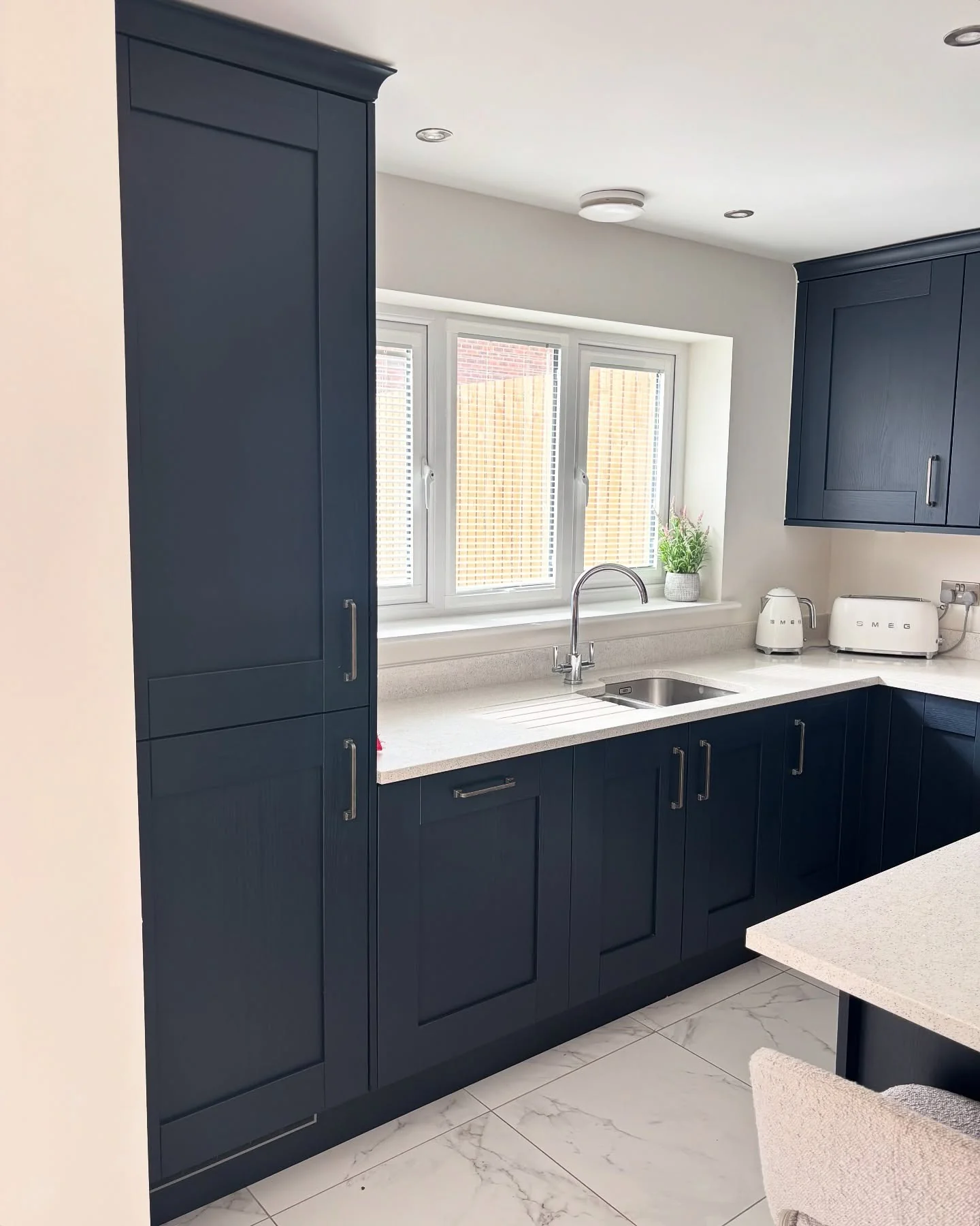 4. Deep Navy with Subtle Sheen (Kitchen Cabinet Paint Ideas)