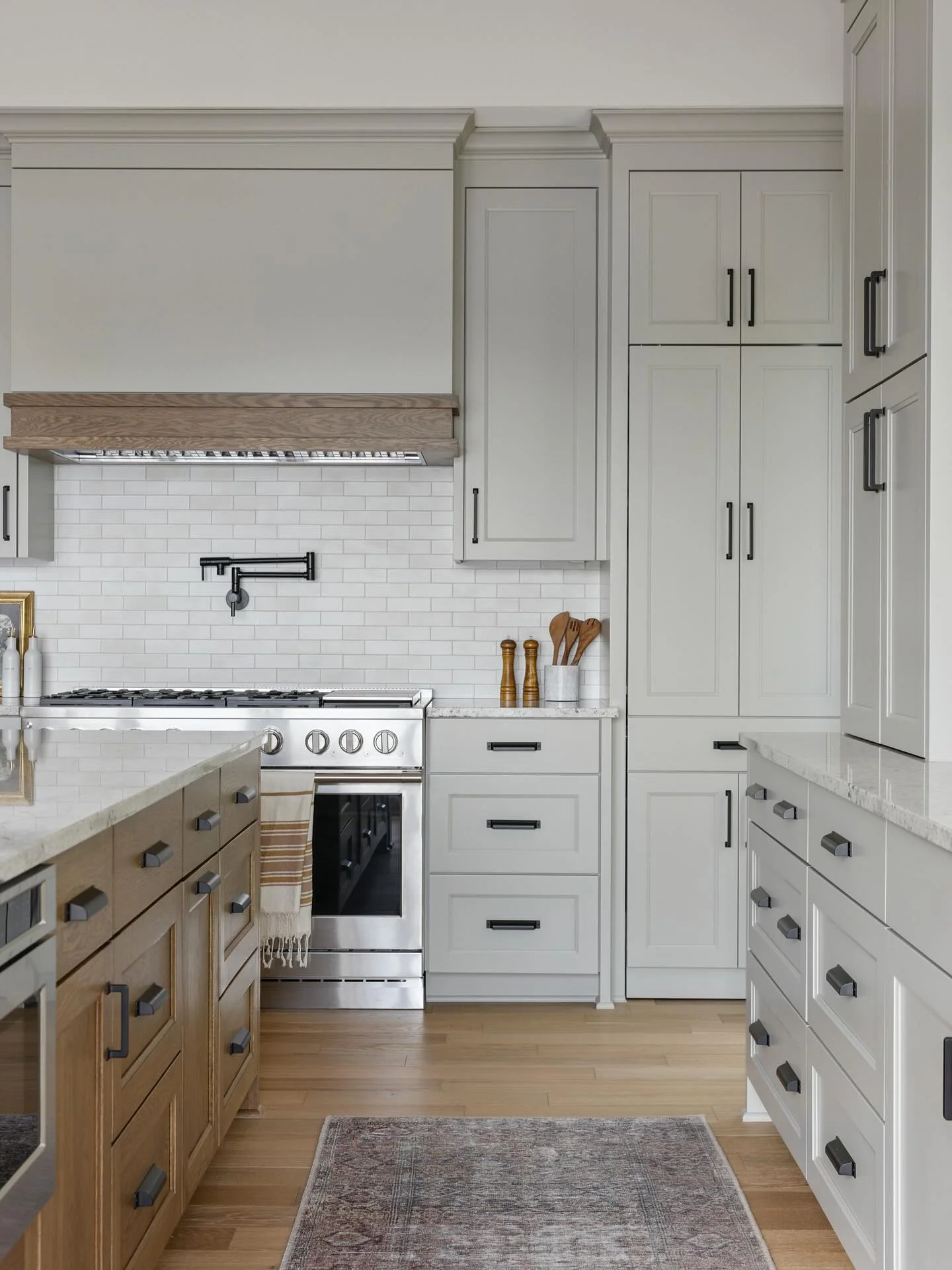 10. Greige with Modern Black Hardware (Kitchen Cabinet Paint Ideas)