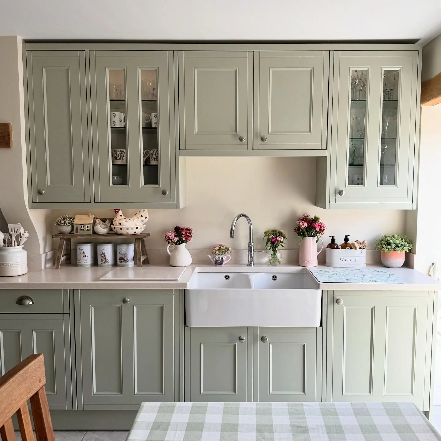 9. Sage Green with Cottage Charm (Kitchen Cabinet Paint Ideas)