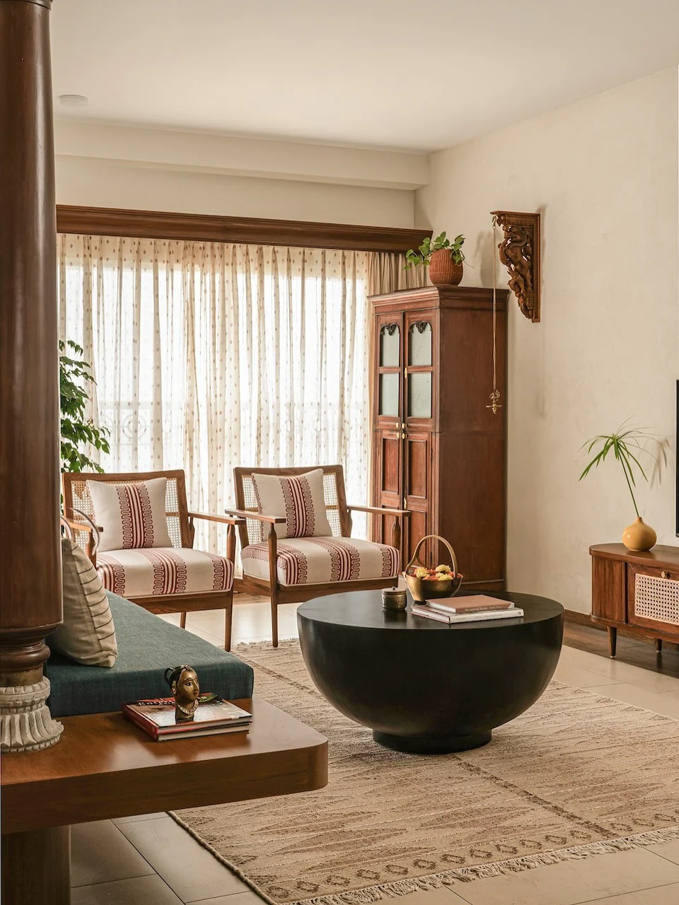 3. Contemporary Indian Warmth with Wood & Cane (Indian Style Living Room Ideas)