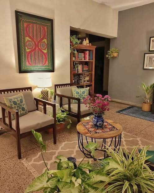 5. Rustic Indian Charm with Cozy Seating (Indian Style Living Room Ideas)