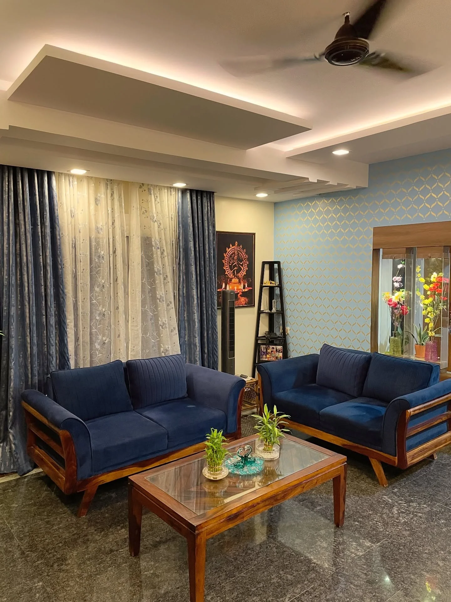 13. Modern Indian Comfort in Deep Blue Tones (Indian Style Living Room Ideas)