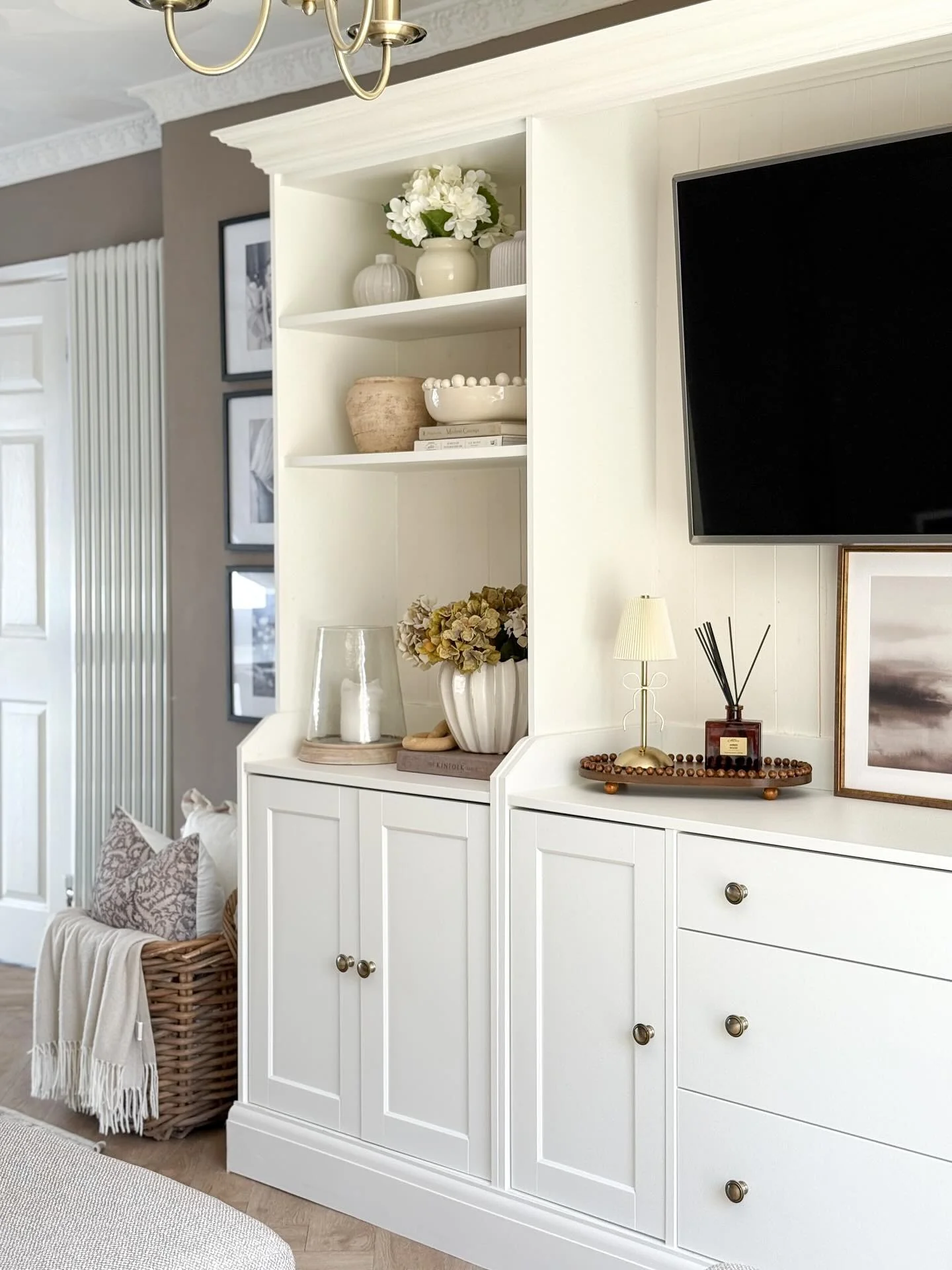 11. Elegant White Built-In Display (Living Room Corner Ideas)