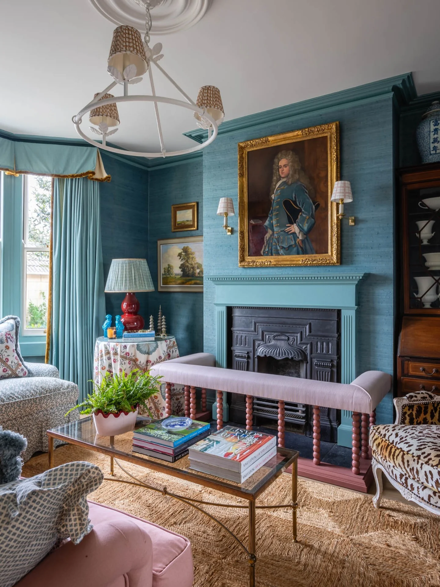 6. Teal Drama with Historic Influence (Paint Ideas for Living Room)