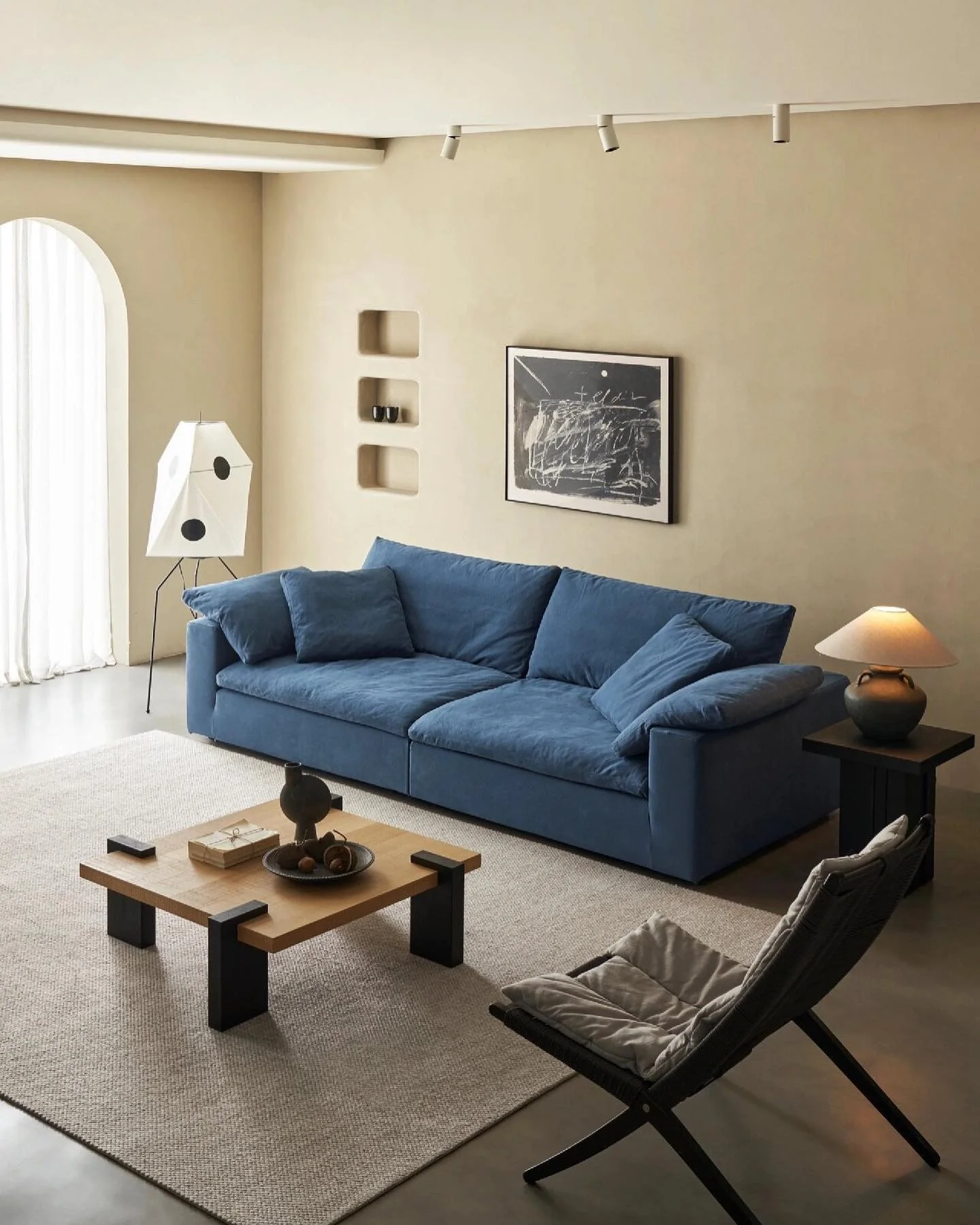 4. Minimalist Comfort in Soft Blue (Living Room Sofa Ideas)