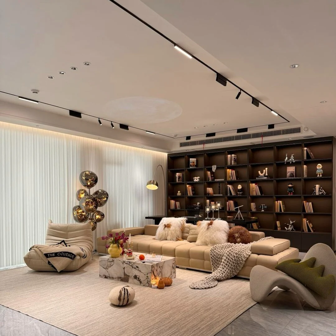5. Chic Lounge with Sculptural Elements (Living Room Sofa Ideas)