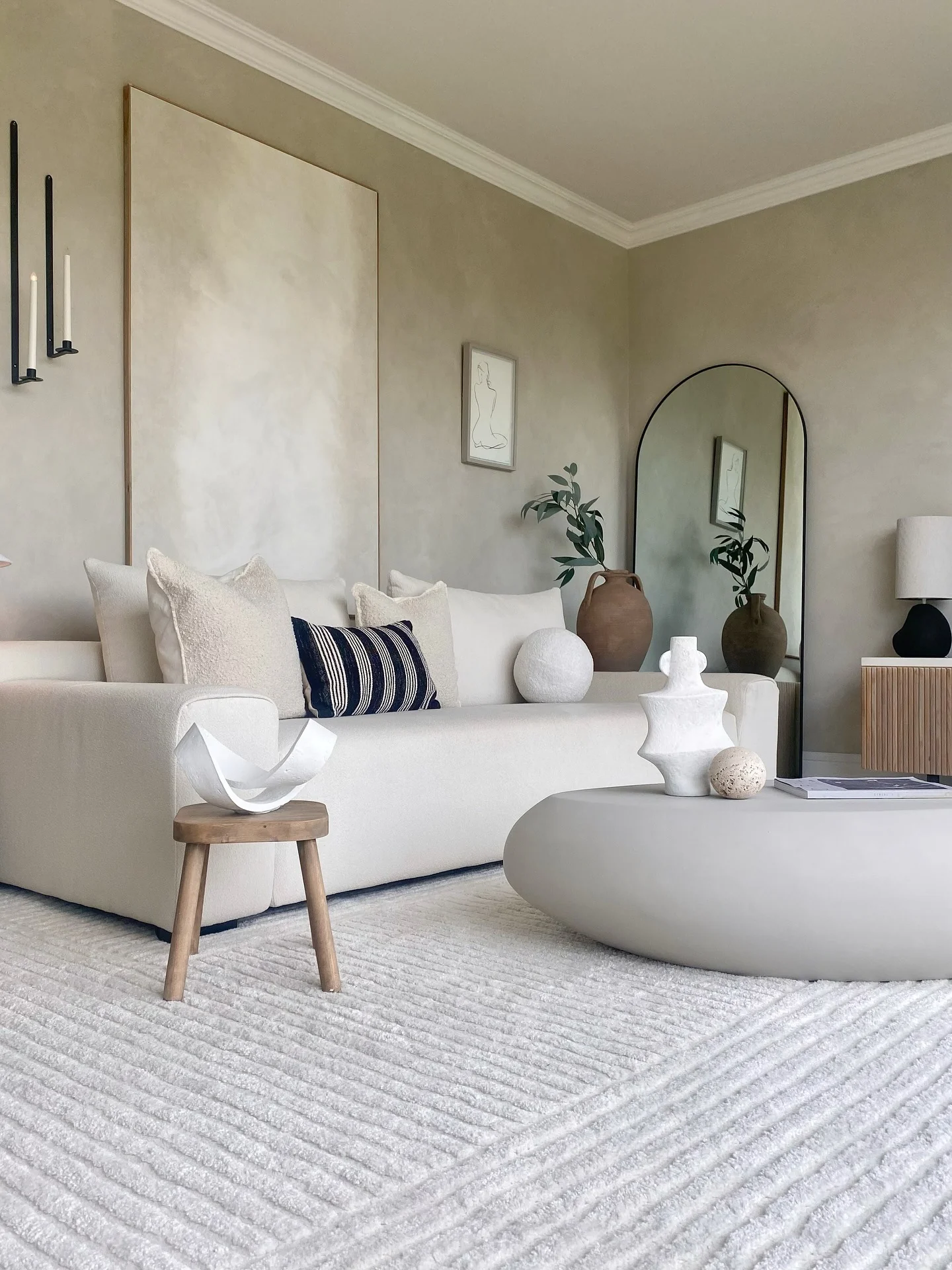 6. Neutral Harmony with Organic Shapes (Living Room Sofa Ideas)