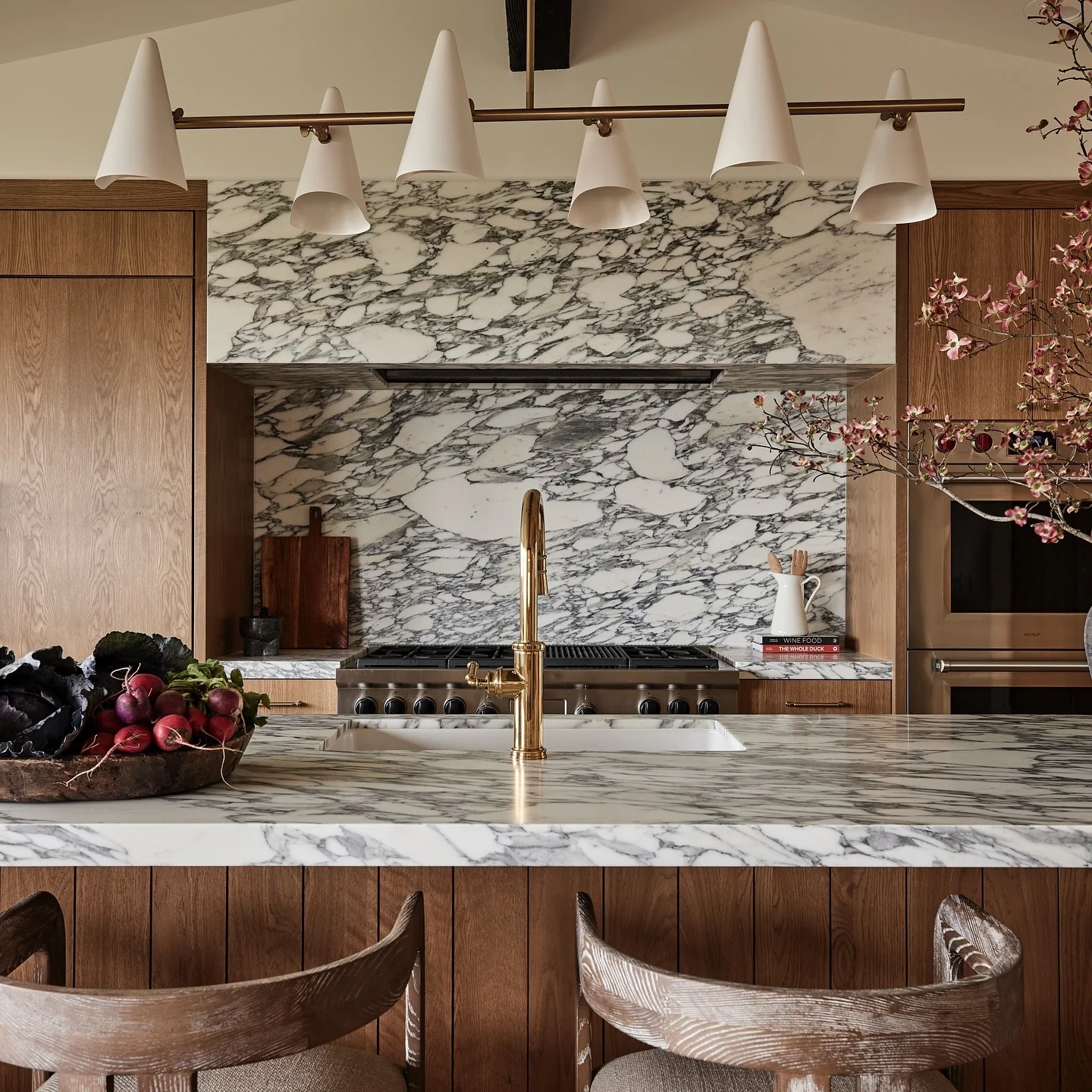 3. Statement Marble with Golden Fixtures (Wooden Kitchen Ideas)