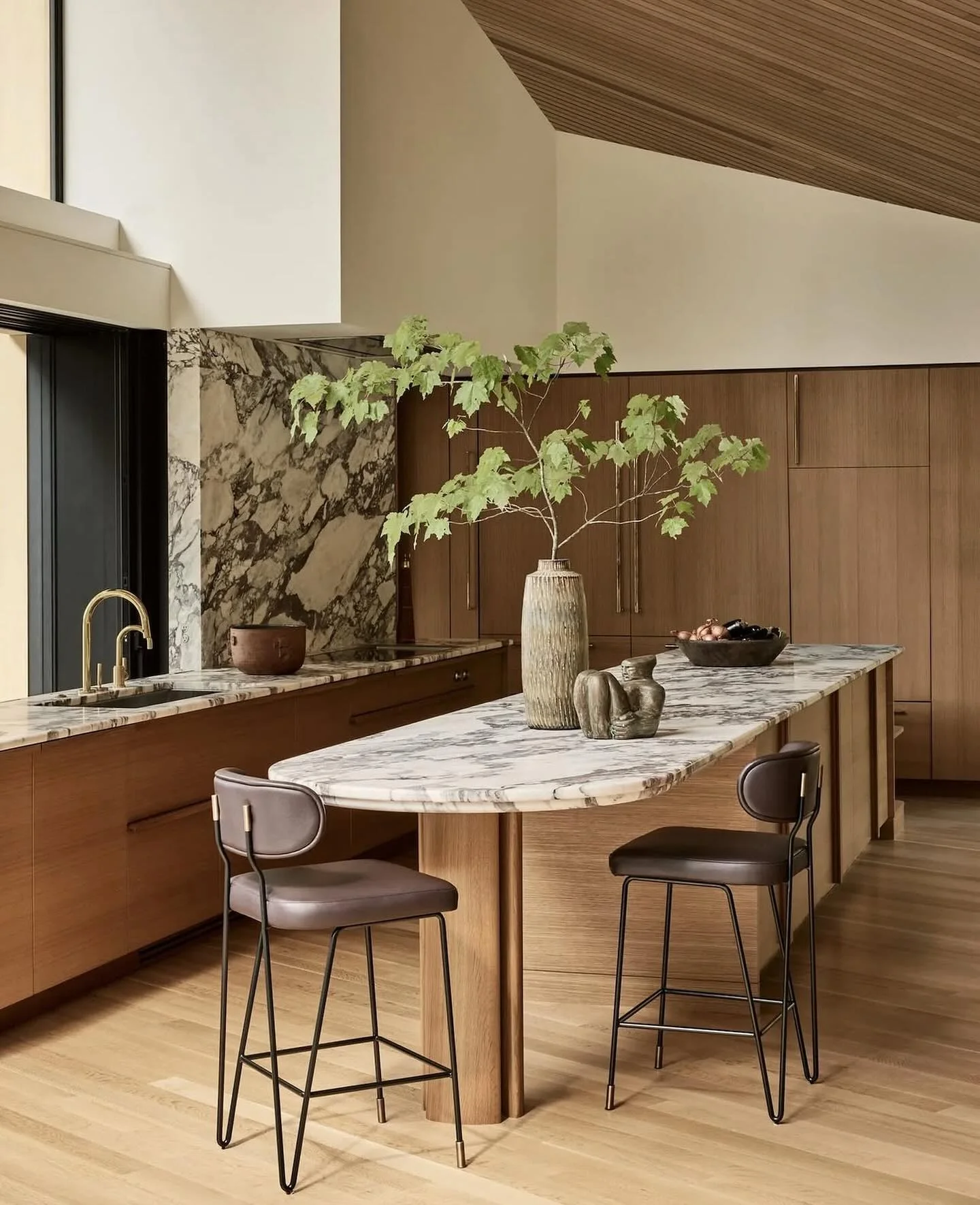 12. Contemporary Warmth with Marble Island (Wooden Kitchen Ideas)