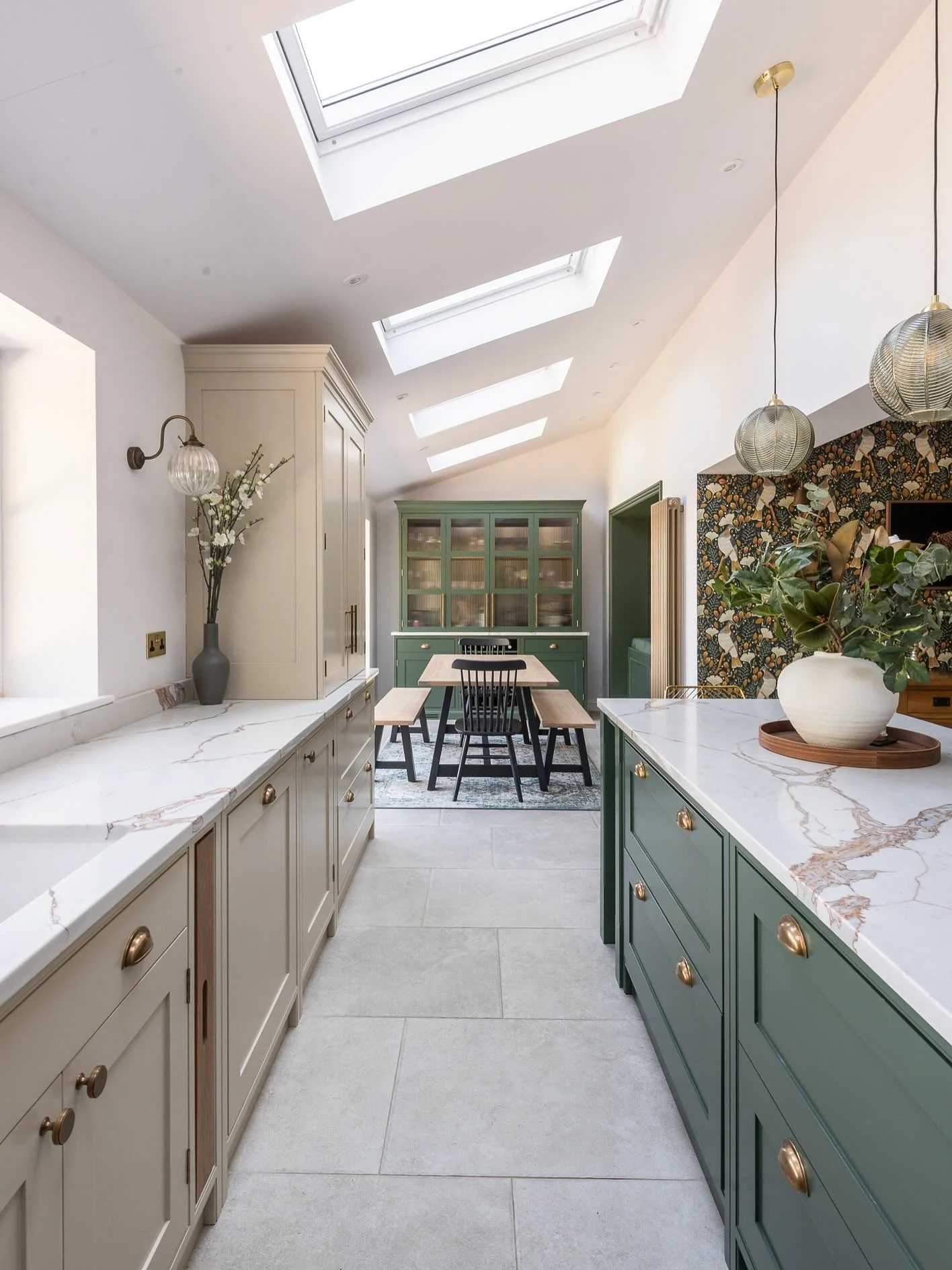 5. Two-Tone Galley Kitchen with Skylight Brightness (Barndo Kitchen Ideas)