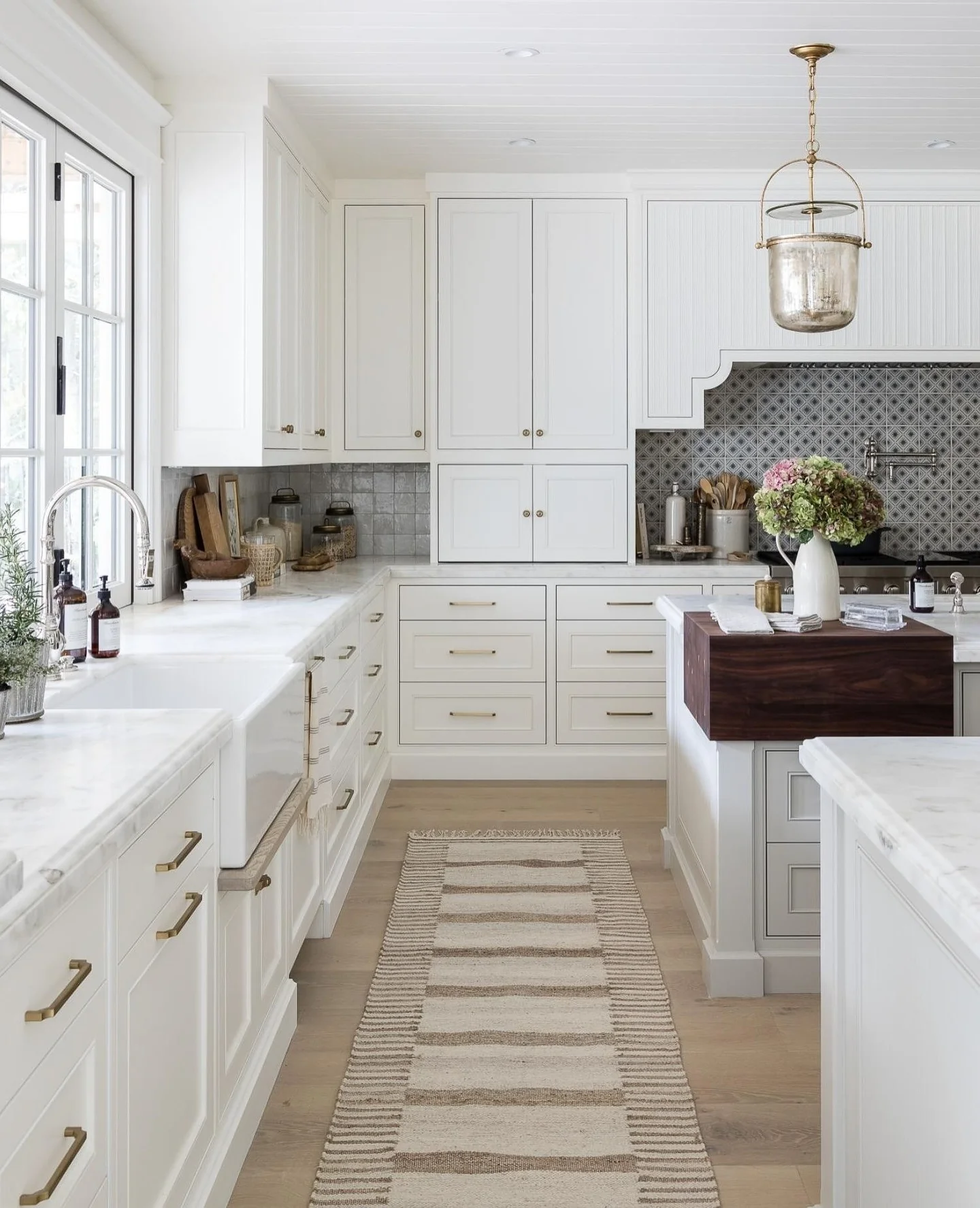 6. Bright White Elegance with Brass Accents (Barndo Kitchen Ideas)