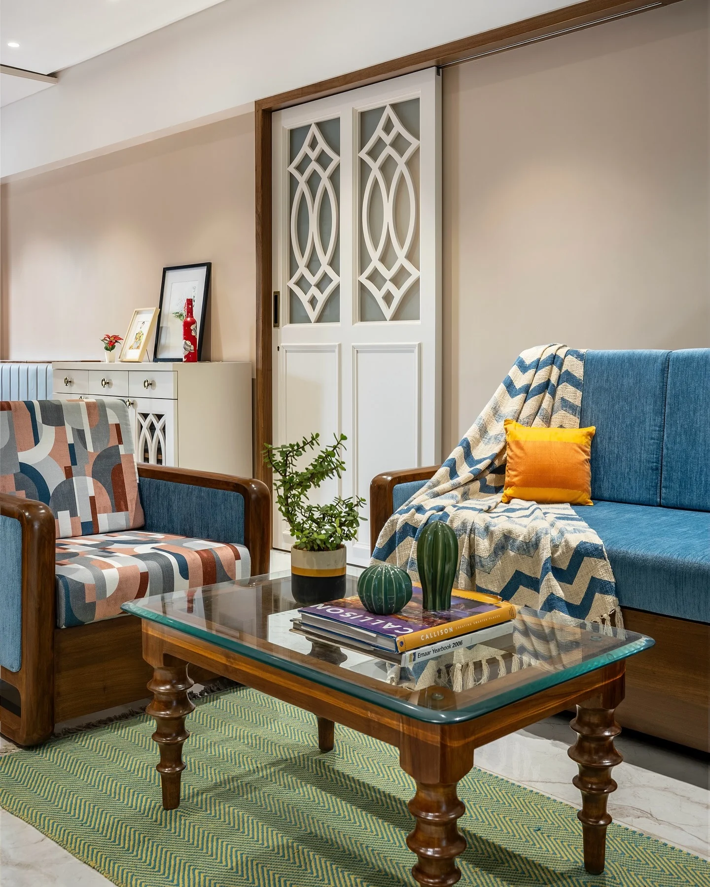 2. Retro-Inspired Elegance with Artful Upholstery (Yellow and Blue Living Room Ideas)