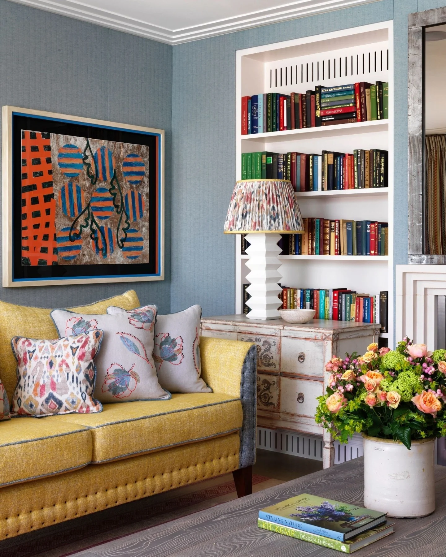 3. Eclectic Library Lounge in Blue-Grey and Marigold (Yellow and Blue Living Room Ideas)