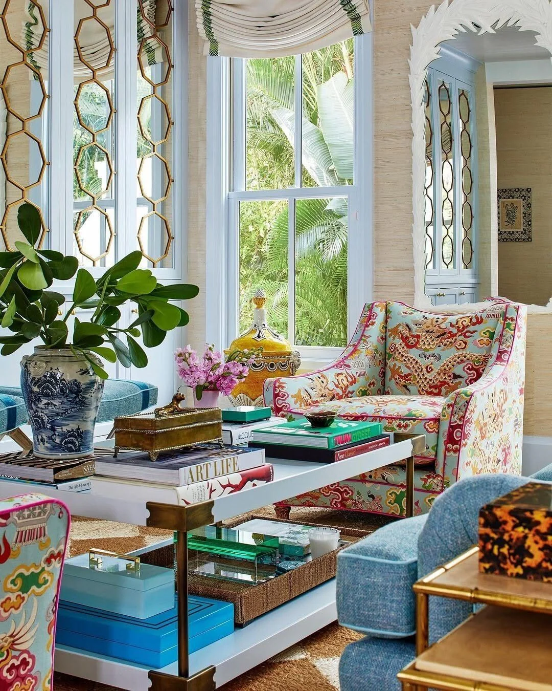 8. Pattern-Rich Maximalism with Jewel Tones (Yellow and Blue Living Room Ideas)