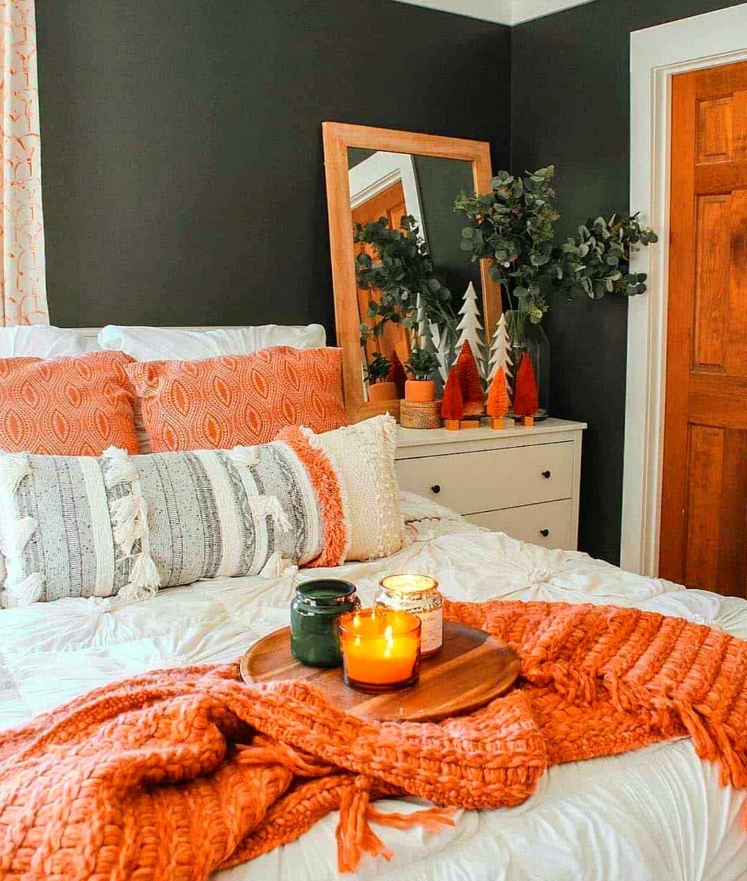 12. Modern Autumn Bedroom with Bold Orange Accents (Fall Bedroom Ideas)
